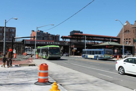 A CTFastrak bus demonstrates the state-municipality disconnect as it approaches the not-yet-complete station at Asylum Street and Union Place in Hartford, 3/29/15. The buses and busway are a state investment; the not-ready-for-opening-day downtown stations are the responsibility of the City of Hartford.